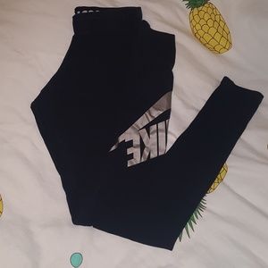 Nike Leg-A-See leggings Black and gold